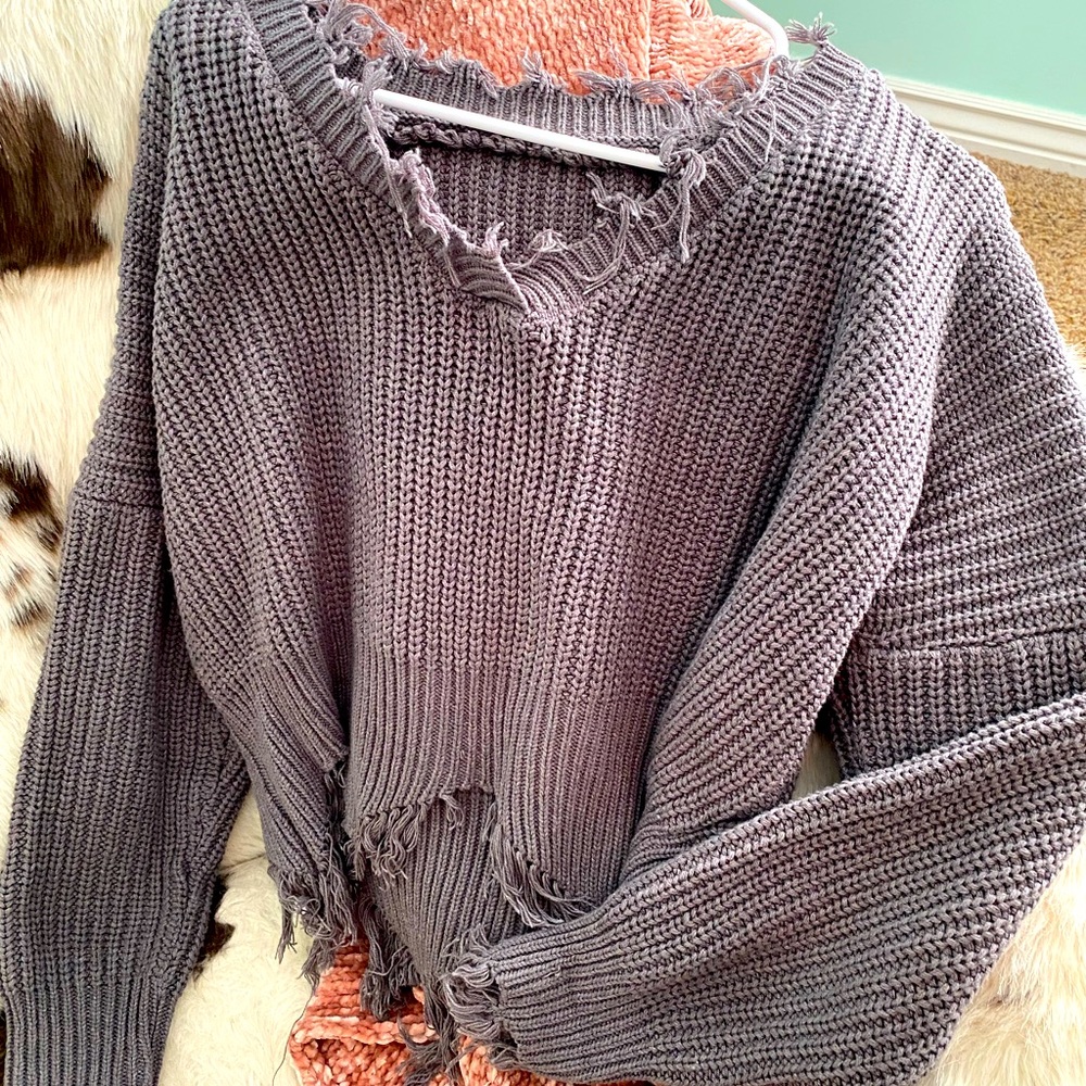 Distressed sweater!